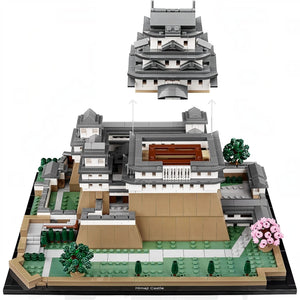 A Brick Apart LEGO Architecture Himeji Castle model with a removable roof section, cherry trees, and detailed stonework.