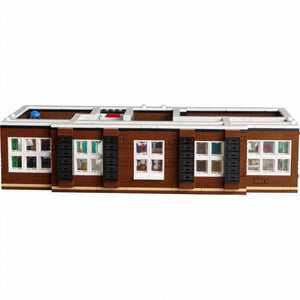 A Brick Apart LEGO Ideas Home Alone McCallisters house modular section showing detailed brick exterior and windows.