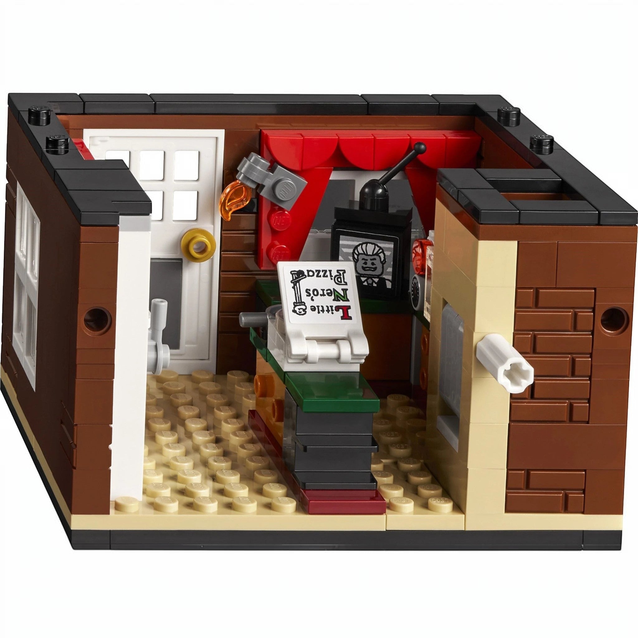 A Brick Apart LEGO Home Alone set interior room featuring a Little Nero's pizza box and vintage television screen.