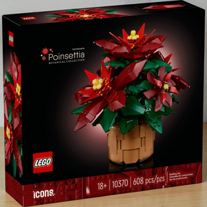 [lifestyle-shelf-box] A Brick Apart LEGO Icons Poinsettia building set box featuring a vibrant red and green floral plant model.