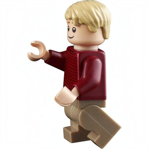 A Brick Apart LEGO Kevin McCallister minifigure from the Home Alone set wearing a dark red sweater and tan pants