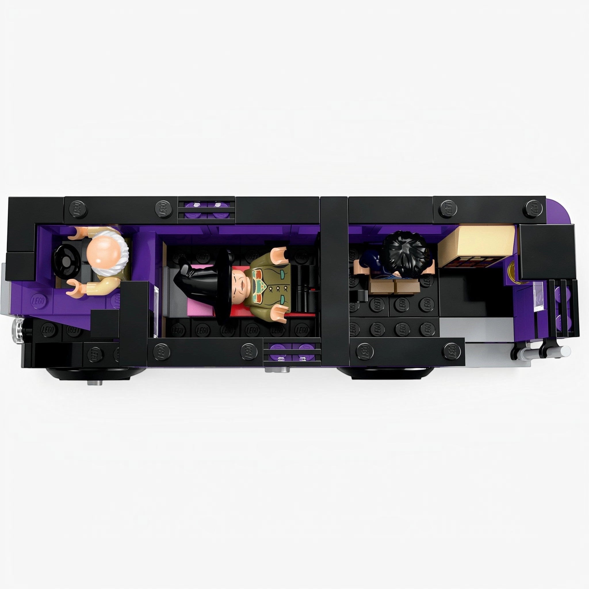 A Brick Apart LEGO Harry Potter Knight Bus interior view showing minifigures in beds and the driver seat.