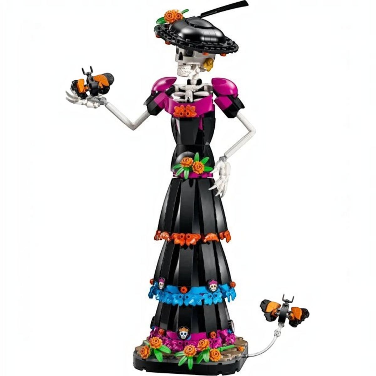 [built-white] A Brick Apart LEGO Ideas La Catrina figurine featuring a skeletal figure in an ornate black dress with marigolds.