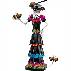 [built-white] A Brick Apart LEGO Ideas La Catrina figurine featuring a skeletal figure in an ornate black dress with marigolds.