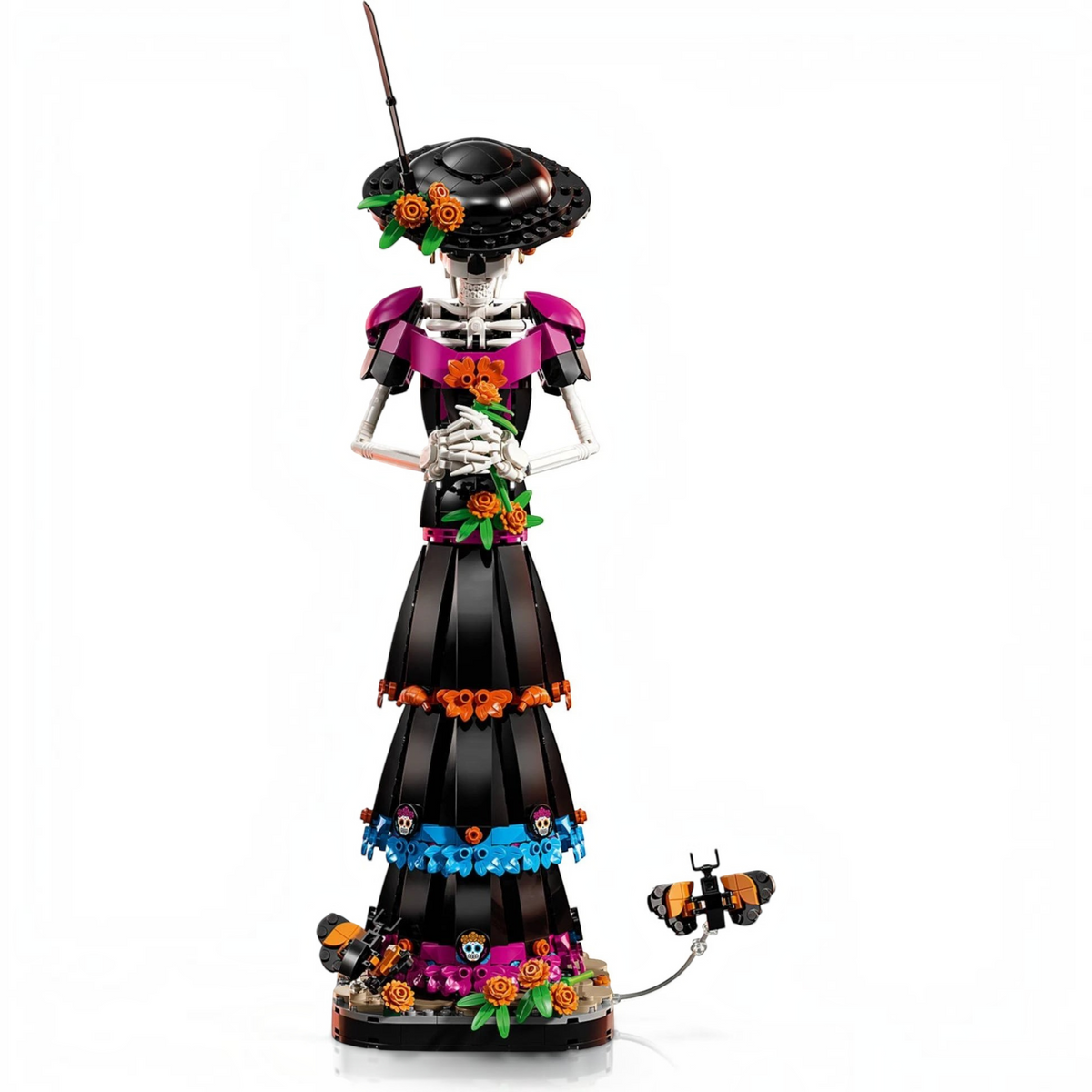 [built-angle] A Brick Apart LEGO Ideas La Catrina figurine featuring a skeletal figure in an elegant black dress with marigolds.