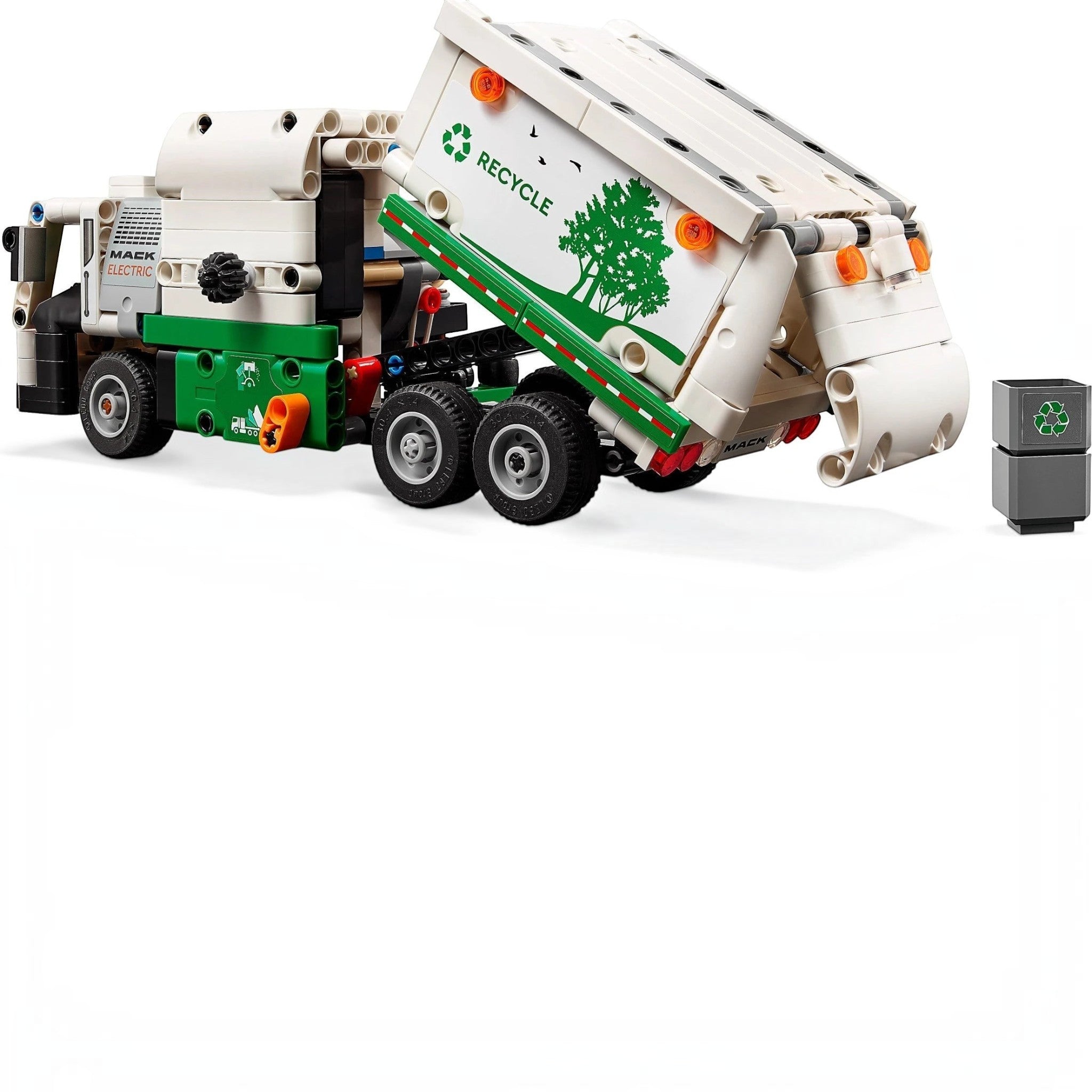 A Brick Apart LEGO Technic Mack LR Electric Garbage Truck with functional side loader, white and green recycling design.