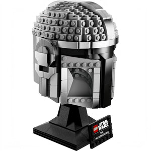 A Brick Apart LEGO Star Wars The Mandalorian helmet model featuring metallic grey beskar armor on a display stand.
