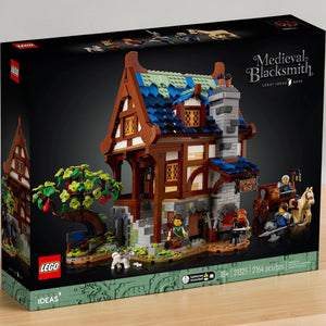 [lifestyle-shelf-box] A Brick Apart LEGO Ideas Medieval Blacksmith set box featuring a detailed timber-framed workshop with minifigures.