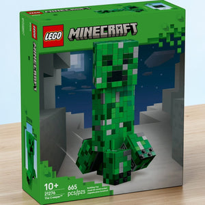 [lifestyle-shelf-box] A Brick Apart LEGO Minecraft The Creeper 21276 building set box featuring a posable green pixelated Creeper figure.