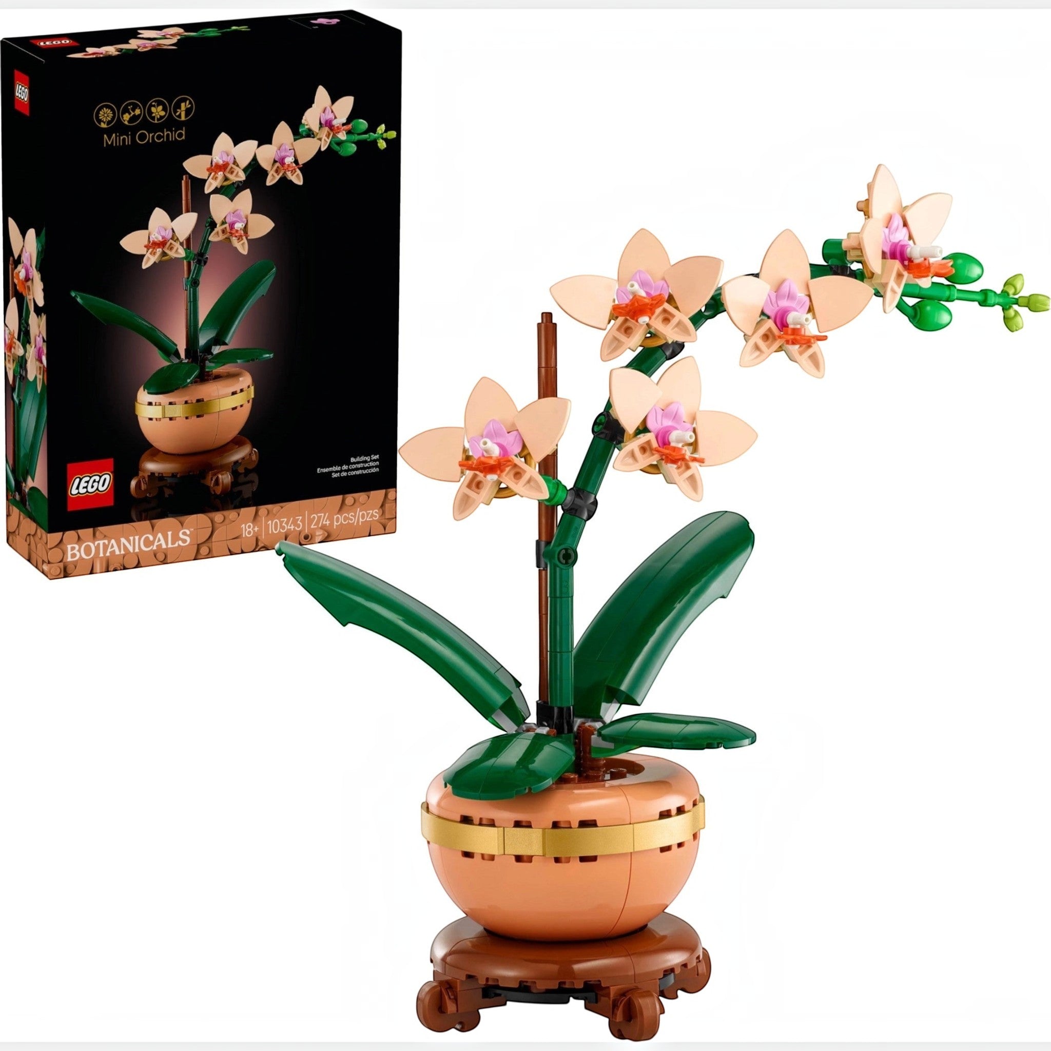 A Brick Apart LEGO Botanicals Mini Orchid set featuring peach flowers in a terracotta pot on a wood-effect plinth.