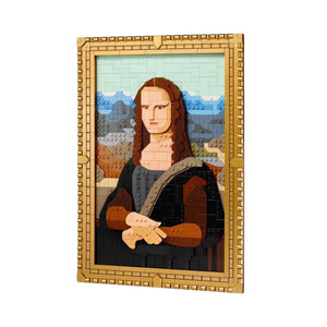 [built-white] A Brick Apart LEGO Art Mona Lisa set featuring a brick-built portrait in a detachable ornate gold-colored frame.