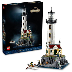 A Brick Apart LEGO Ideas Motorised Lighthouse set with rotating light, cottage, rocky base, and two minifigures.