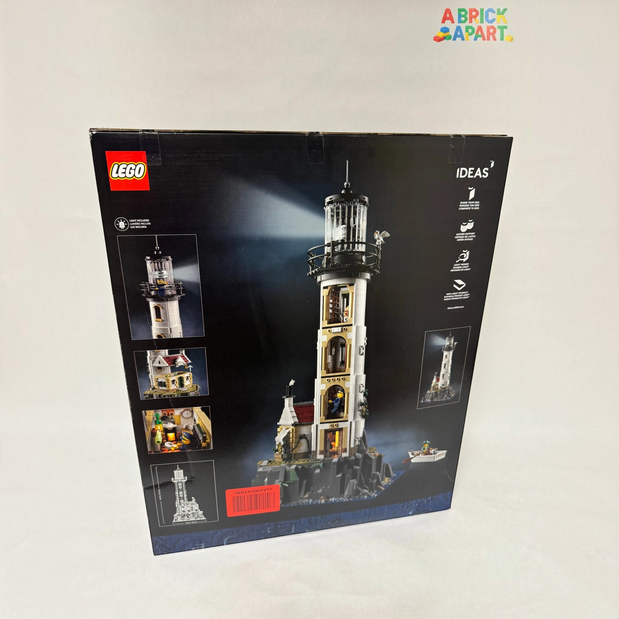 A Brick Apart LEGO Ideas Motorised Lighthouse box showing the tall tower, cottage, and rotating light features.