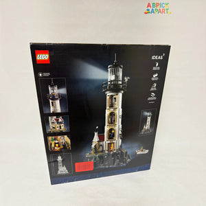 A Brick Apart LEGO Ideas Motorised Lighthouse box showing the tall tower, cottage, and rotating light features.