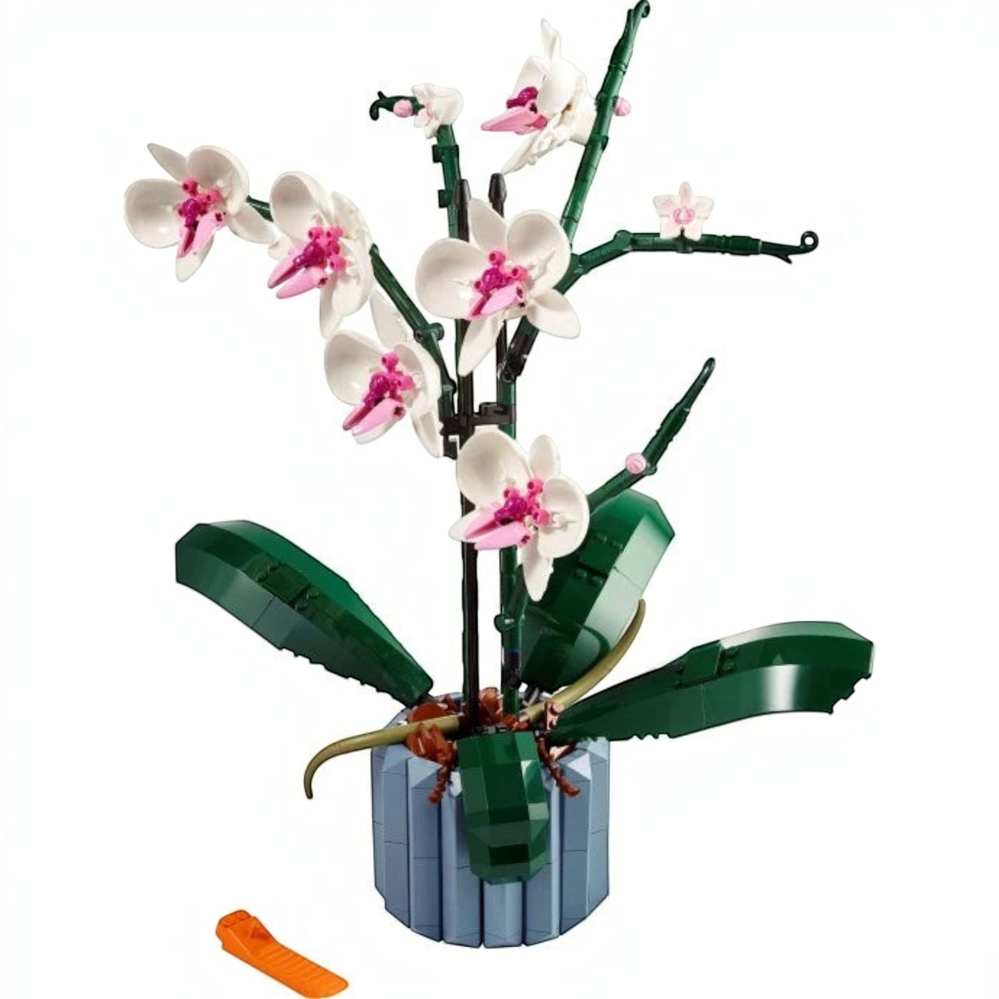 A Brick Apart LEGO Icons Orchid set featuring white and pink flowers in a blue fluted vase with green leaves.