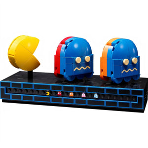 A Brick Apart LEGO Icons PAC-MAN display stand with rotatable PAC-MAN, BLINKY, and CLYDE figures on a black base.
