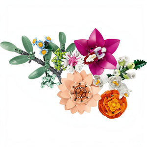 A Brick Apart LEGO Botanicals Pretty Pink Flower Bouquet featuring assorted plastic flowers in shades of pink and orange.
