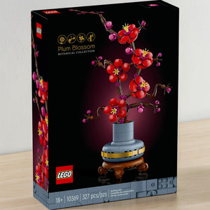 A Brick Apart LEGO Icons Plum Blossom building set box featuring a red and magenta floral display in a blue pot.