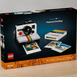 A Brick Apart LEGO Ideas Polaroid OneStep SX-70 camera set box showing the buildable vintage camera and photo prints.