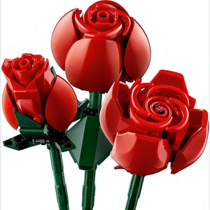 A Brick Apart LEGO Icons Bouquet of Roses featuring three vibrant red plastic roses with green stems in full bloom.