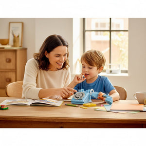 [lifestyle-person] A Brick Apart LEGO Creator Retro Telephone being built by a mother and son at a wooden table in a bright room.