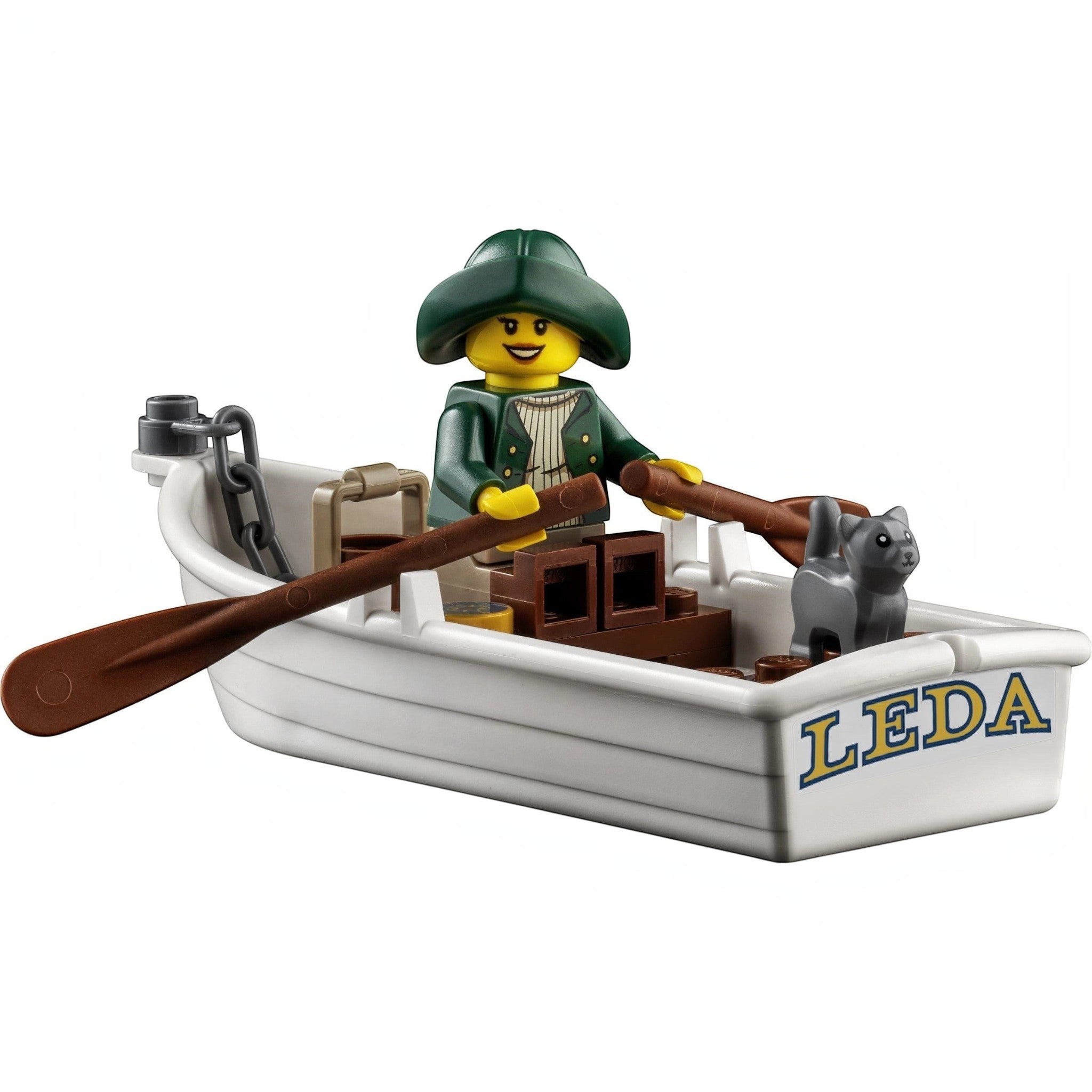 A Brick Apart LEGO minifigure sailor rowing a white boat named LEDA with a grey cat figure on board.