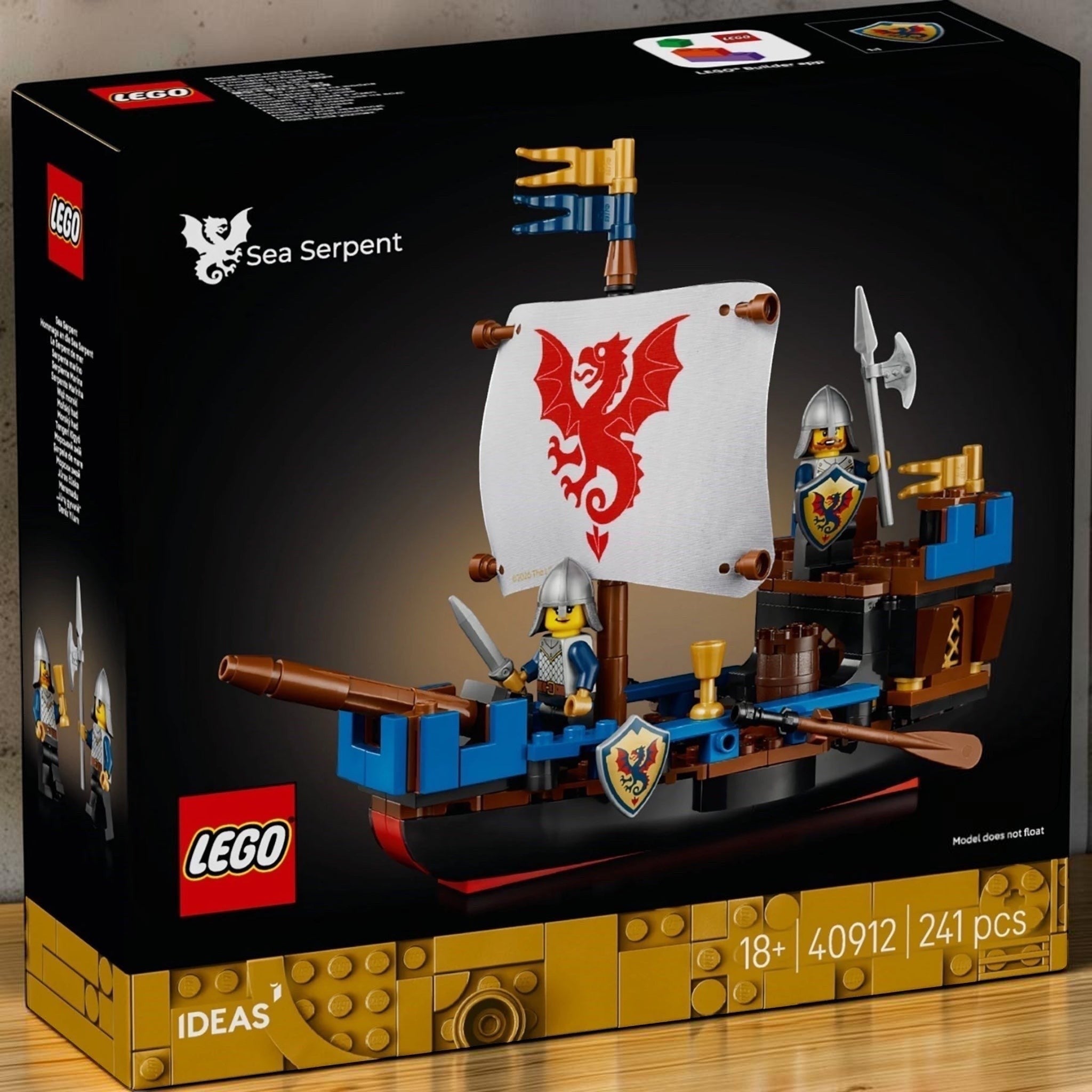 A Brick Apart LEGO Ideas Sea Serpent ship model box featuring a medieval knight minifigure and a dragon-printed sail.