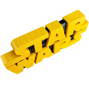 A Brick Apart LEGO Star Wars logo sign featuring bright yellow 3D letters with black greebling details on white background