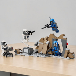 [lifestyle-shelf-built] A Brick Apart LEGO Star Wars Ambush on Mandalore set featuring four minifigures, a rock cave, and a stud-shooting cannon