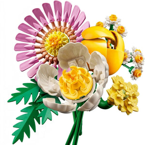 A Brick Apart LEGO Botanicals Petite Sunny Bouquet featuring pastel pink, yellow, and white plastic flower bricks.