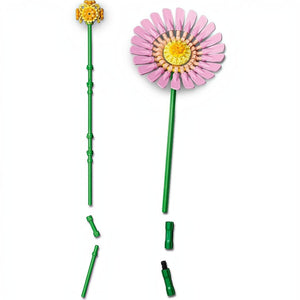 A Brick Apart LEGO Botanicals Petite Sunny Bouquet featuring a pink gerbera and yellow Billy button flower stems.