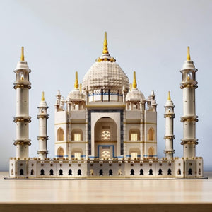 [lifestyle-shelf-built] A Brick Apart LEGO Creator Expert Taj Mahal model featuring ivory-white marble architecture with intricate domes.