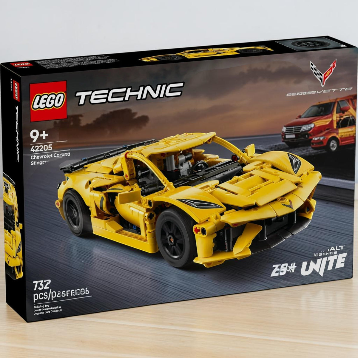 [lifestyle-shelf-box] A Brick Apart LEGO Technic Chevrolet Corvette Stingray model kit box featuring a vibrant yellow sports car design