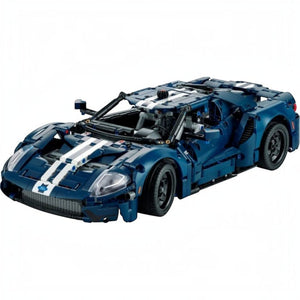 A Brick Apart LEGO Technic 2022 Ford GT model in dark blue with white racing stripes and intricate mechanical details.
