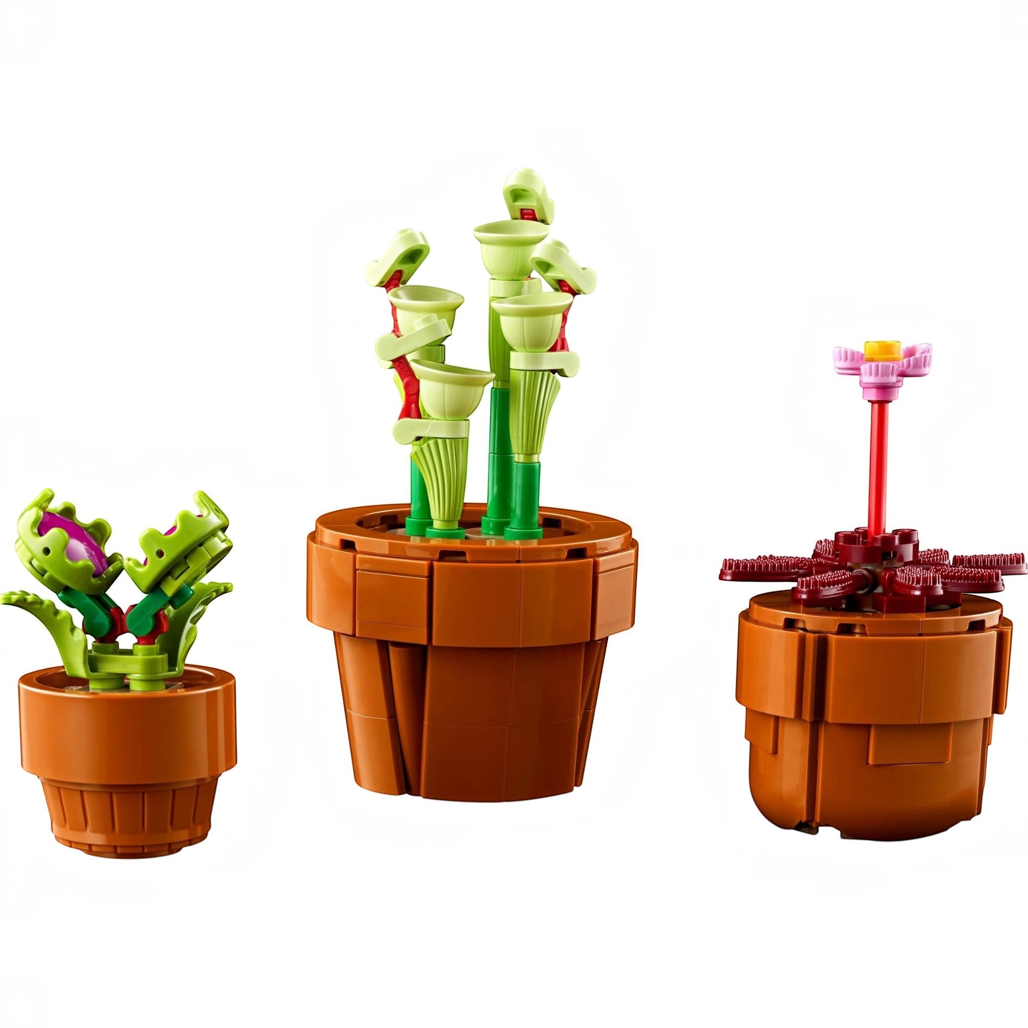 A Brick Apart LEGO Icons Tiny Plants set featuring three buildable carnivorous plants in terracotta-colored pots.
