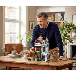 [lifestyle-person] A Brick Apart man building the LEGO Icons Tudor Corner modular set on a wooden table in a cozy living room.