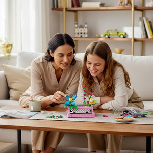 A Brick Apart LEGO Creator 3in1 typewriter set with colorful flowers being built by a mother and daughter at home.