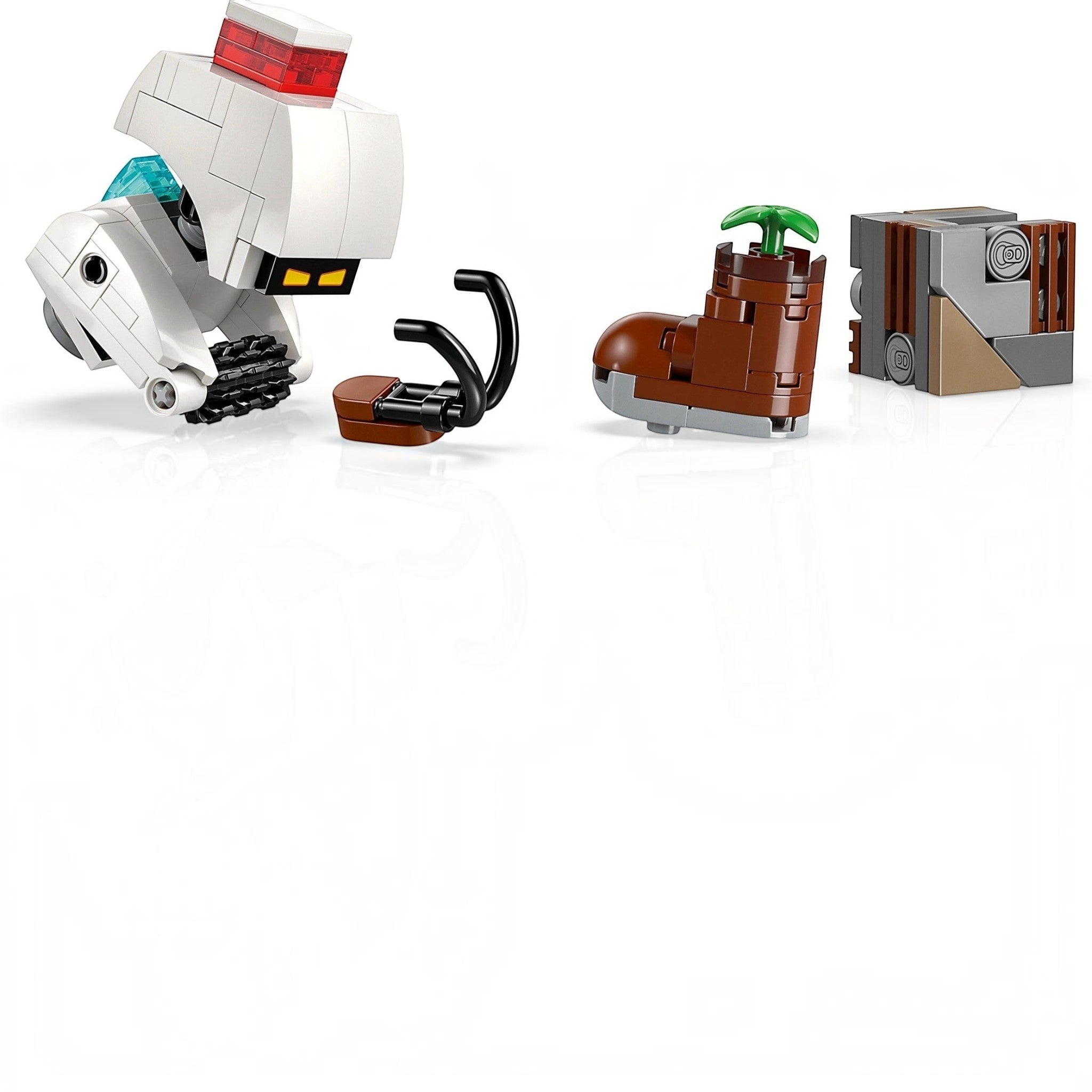 A Brick Apart LEGO Disney WALL-E and EVE building set featuring the robot characters and a plant in a brown boot.