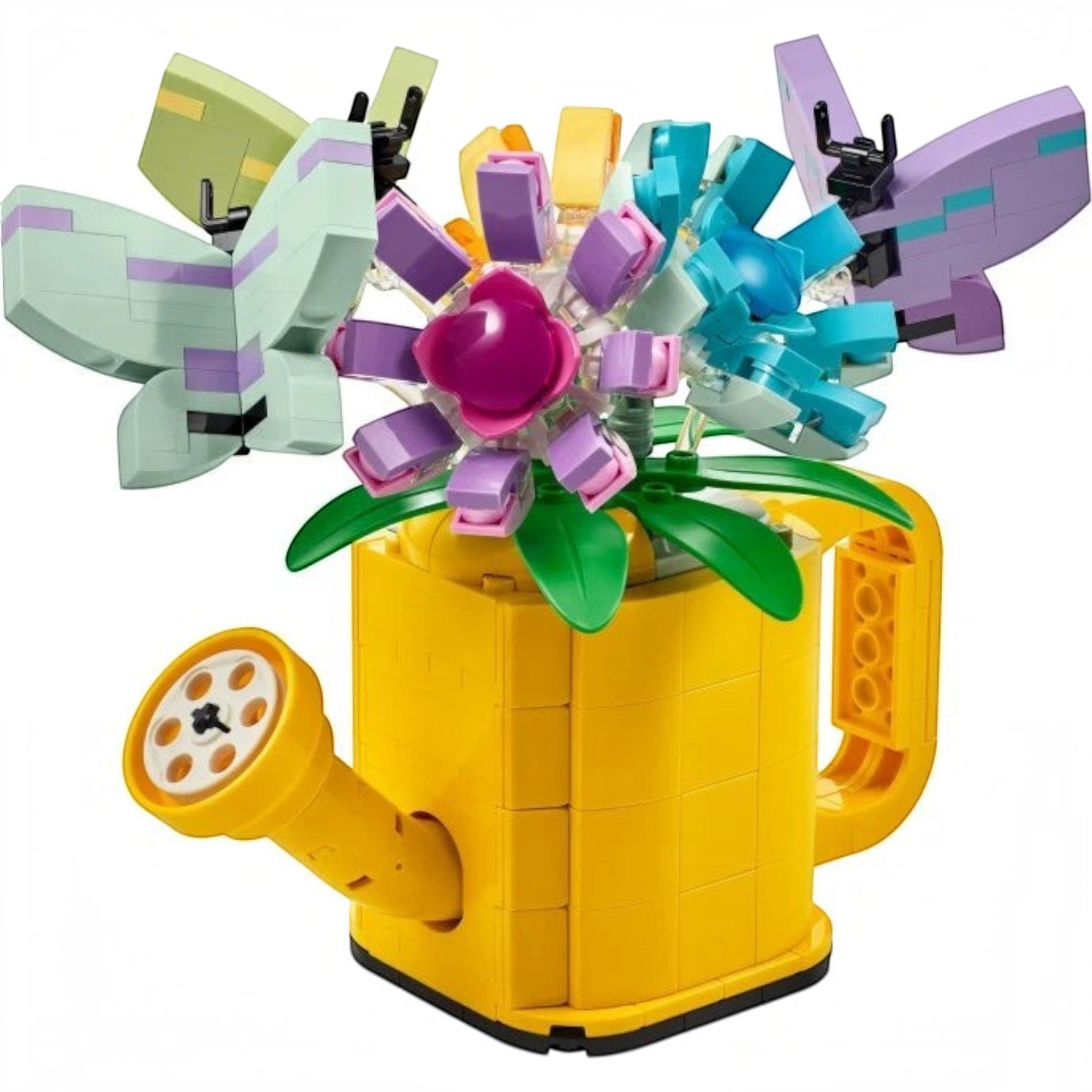 A Brick Apart LEGO Creator yellow watering can filled with colorful brick-built flowers and butterflies on sticks.