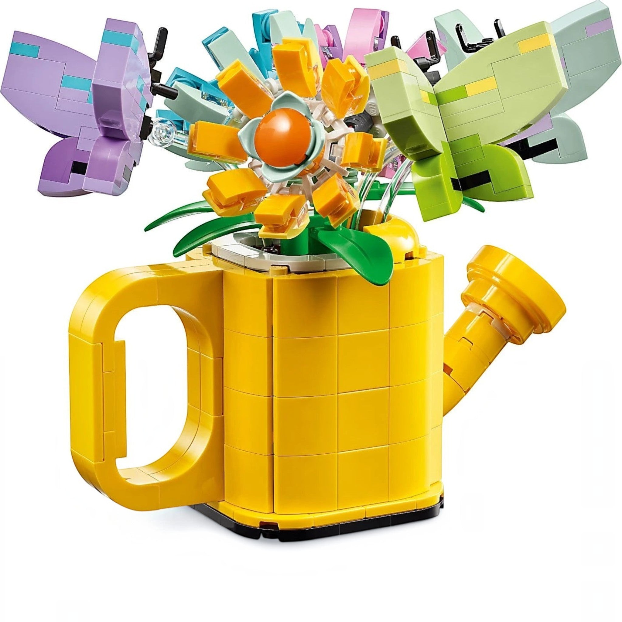 A Brick Apart LEGO Creator yellow watering can filled with colorful brick-built flowers and butterflies on sticks.