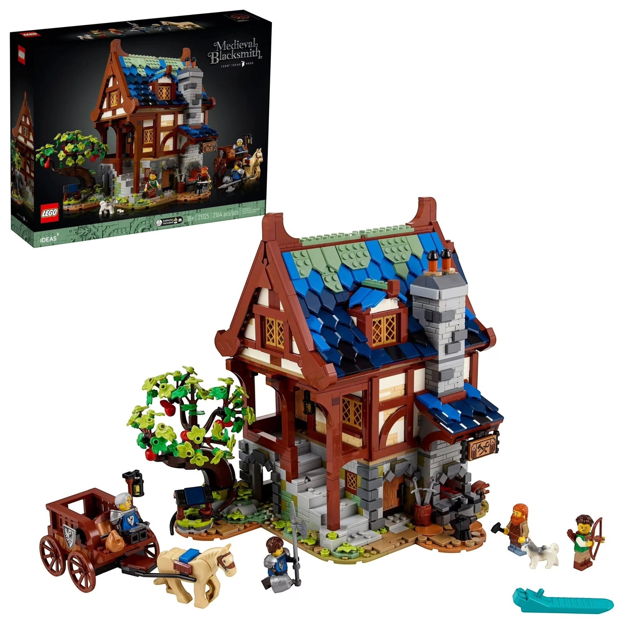 LEGO model of a medieval house with accessories and packaging on a white background