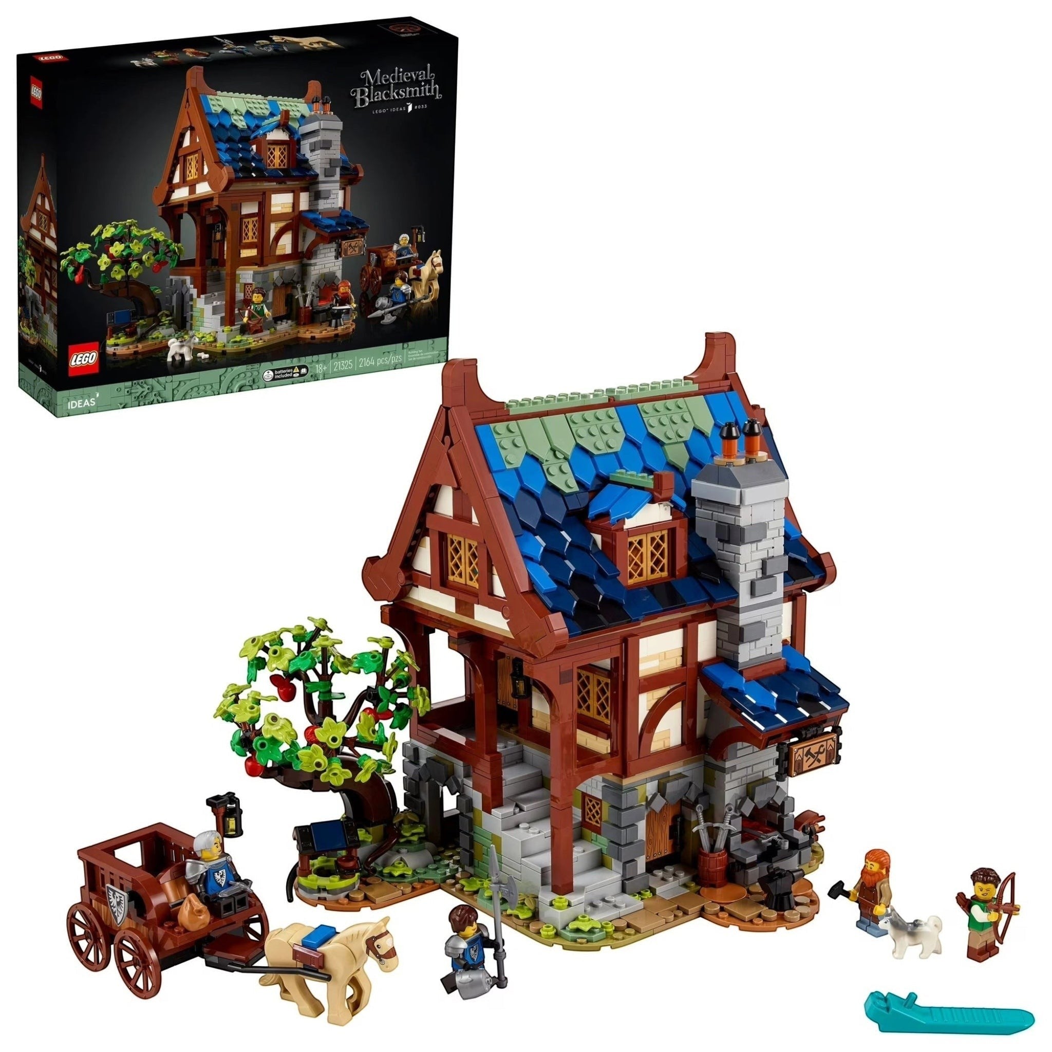 LEGO model of a medieval house with accessories and packaging on a white background