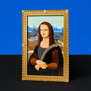 [built-blue-black] A framed art piece built from interlocking toy blocks, depicting Leonardo da Vinci's Mona Lisa with a gold-toned frame, set against a solid blue and black background.