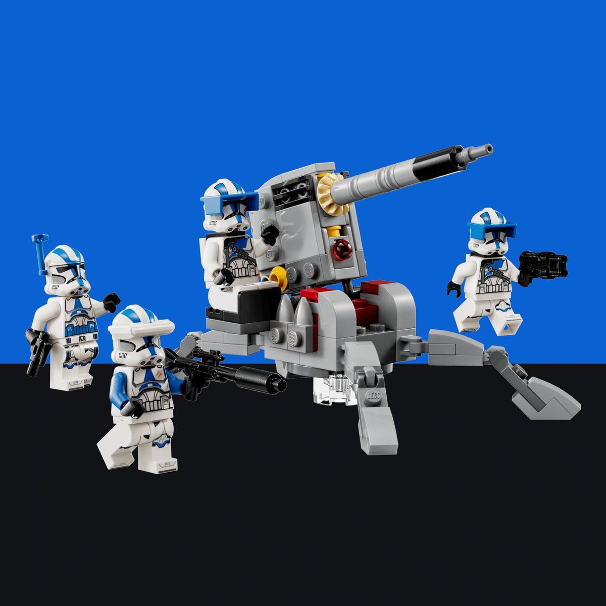 [built-blue-black] A LEGO Star Wars toy set featuring a gray and black quadcopter-style cannon mount with three white and blue Clone Trooper minifigures, shown against a split blue and black background.