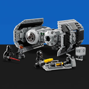 [built-blue-black] A LEGO Star Wars set featuring a large gray and white TIE fighter, Darth Vader minifigures, a small X-wing, and a droid, displayed on a black surface against a blue background.
