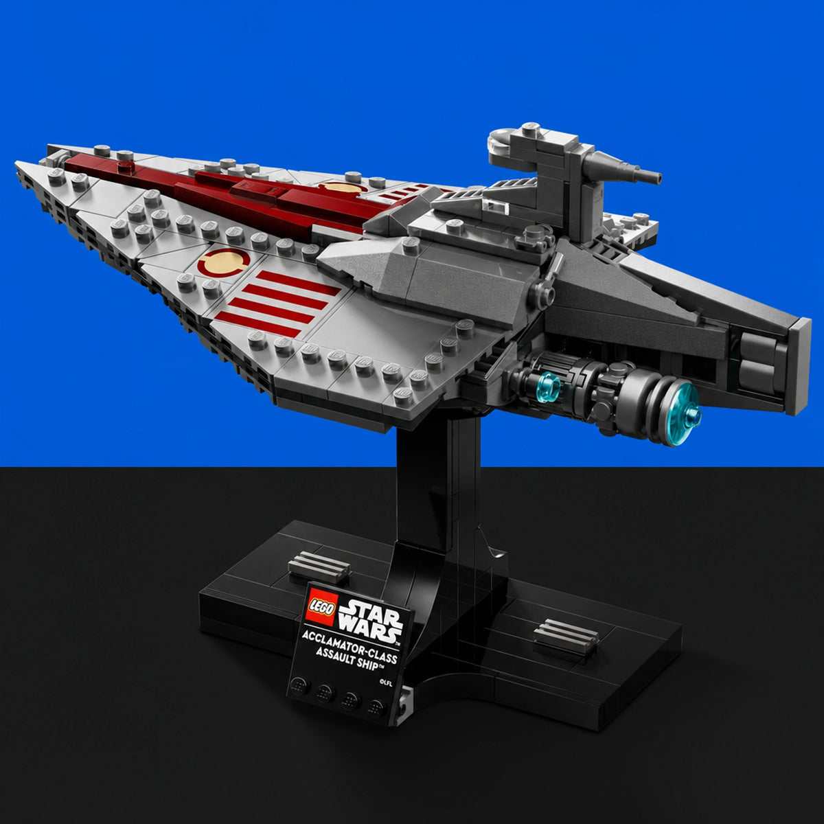 [built-blue-black] A LEGO Star Wars Acclimander-Class Assault Ship model displayed on a black stand against a split blue and black background.