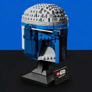 [built-blue-black] LEGO Star Wars Lando Fett helmet model on a display stand, featuring a blue and gray helmet design with a black base, set against a split blue and black background.
